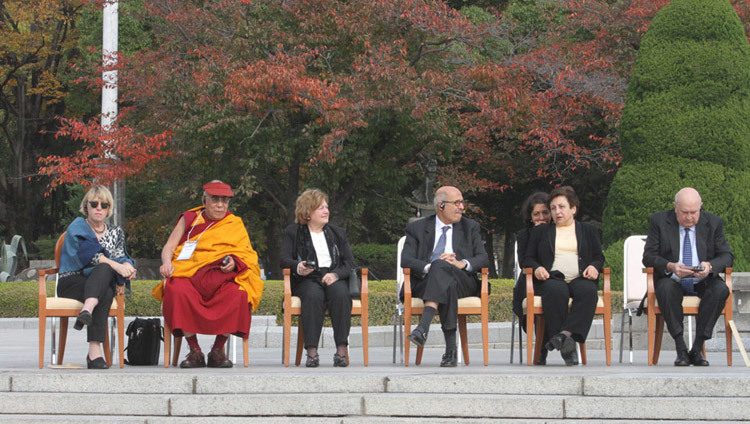 His Holiness the Dalai Lama and fellow Nobel Laureates at the Hiroshima Memorial Park on the third day of the 11th World Summit of Nobel Peace Laureates in Hiroshima, Japan on November 14th, 2010. (Photo by Taikan Usui)