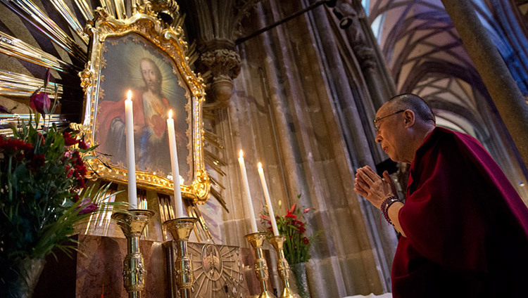 His Holiness the Dalai Lama takes a moment for reflection during his visit to St Stephen's Cathedral in Vienna, Austria on May 27, 2012. (Photo by Tenzin Choejor/OHHDL)